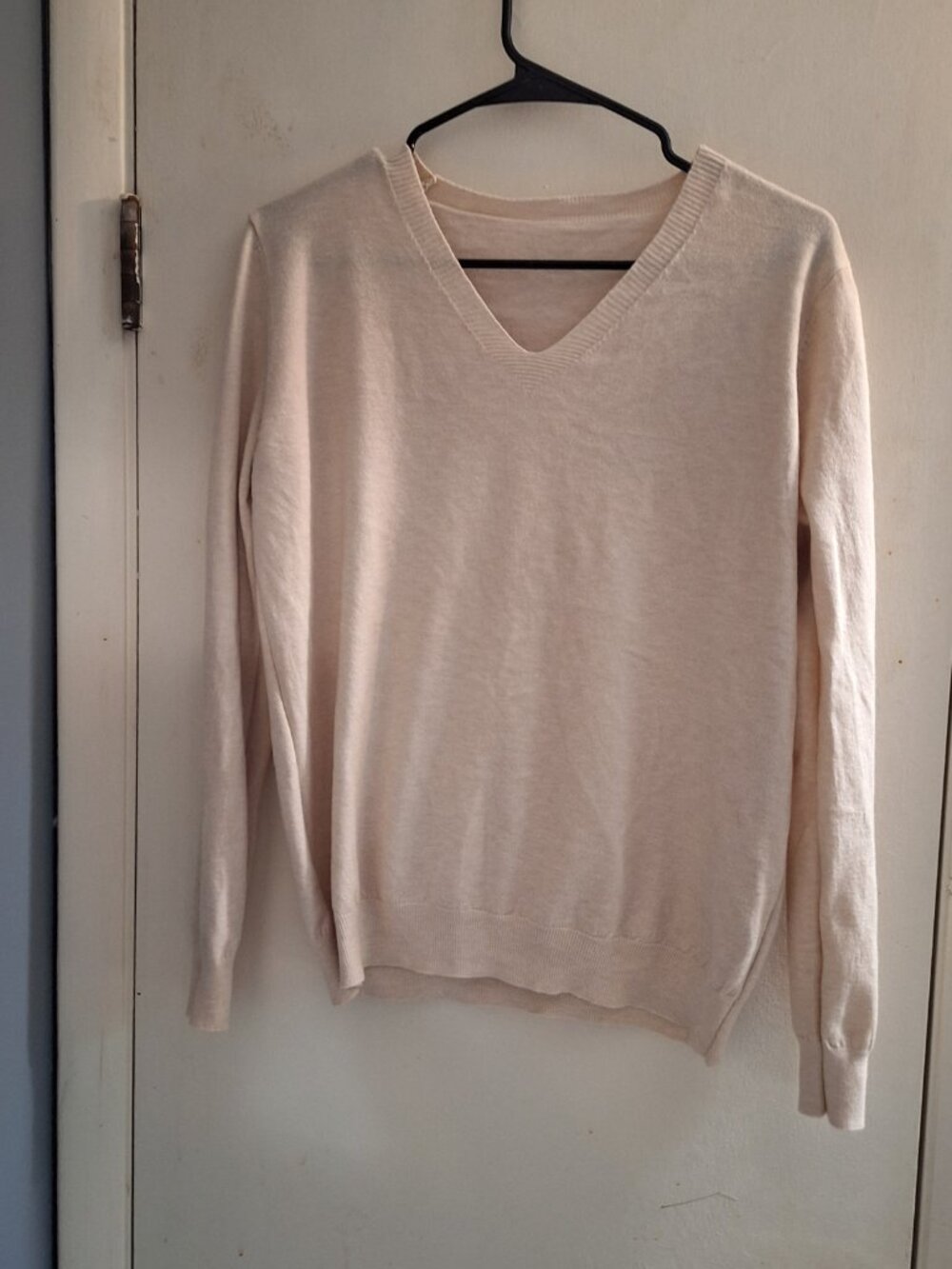 cream or tan sweater